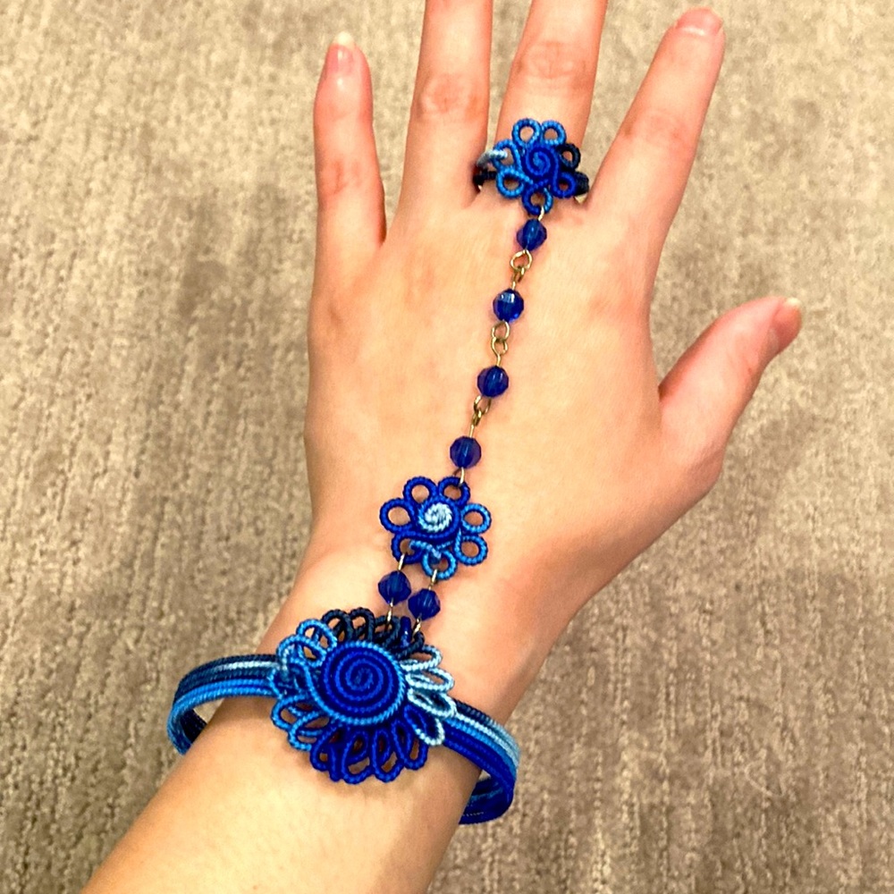 Blue bracelet with ring attached from South America